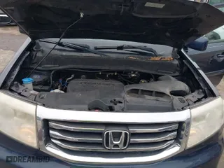 2012 Honda Pilot EX-L with VIN 5FNYF4H6XCB037404, listed as a IAAI auction lot 41832555 with 192,146 mi miles. Bid and sale history available at carsss.com. Image 10.