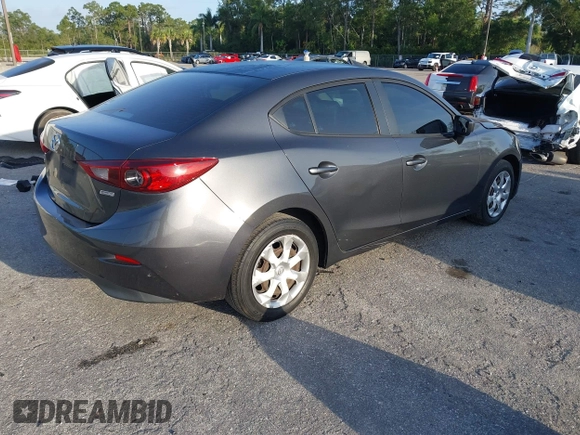 2016 Mazda 3 i Sport with VIN 3MZBM1T70GM305353, listed as a IAAI auction lot 42101846 with 103,791 mi miles and . Bid and sale history available at carsss.com. Image 4.