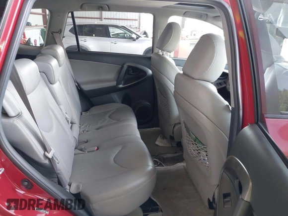 2010 Toyota RAV4 Limited with VIN JTMDF4DV1AD032558, listed as a IAAI auction lot 42247106 with 117,841 mi miles and . Bid and sale history available at DreamBid. Image 8.
