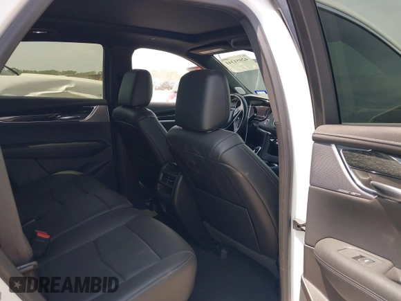 2021 Cadillac XT5 FWD Premium Luxury z VIN 1GYKNCR42MZ174309, wystawiony jako IAAI lot #42051341 z przebiegiem 75 544 mil mil oraz . Historia ofert i sprzedaży dostępna na DreamBid. Obrazek 8.