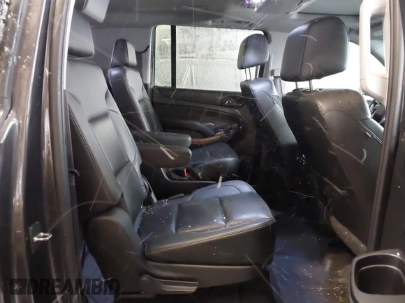 2017 Chevrolet Suburban Premier z VIN 1GNSKJKC0HR274605, wystawiony jako IAAI lot #41828392 z przebiegiem 144 747 mil mil oraz . Historia ofert i sprzedaży dostępna na DreamBid. Obrazek 8.