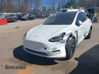 2021 Tesla Model Y Long Range with VIN 5YJYGDEE8MF125104, listed as a IAAI auction lot 41698065 with 25,177 mi miles and . Bid and sale history available at DreamBid. Image 16.