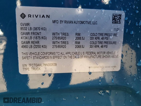 2022 Rivian R1T Launch Edition z VIN 7FCTGAAL7NN000539, wystawiony jako Copart lot #87811245 z przebiegiem Nie podano mil oraz Szkody całkowita. Historia ofert i sprzedaży dostępna na DreamBid. Obrazek 13.
