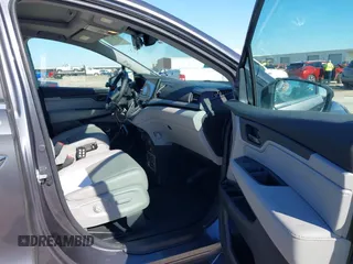2024 Honda Odyssey EX-L with VIN 5FNRL6H63RB037259, listed as a IAAI auction lot 41665850 with 2,710 mi miles and . Bid and sale history available at DreamBid. Image 5.