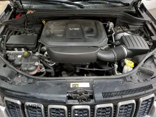 2017 Jeep Grand Cherokee Trailhawk with VIN 1C4RJFLG8HC618709, listed as a Copart auction lot 52899194 with 69,000 mi miles and Salvage title. Bid and sale history available at DreamBid. Image 12.