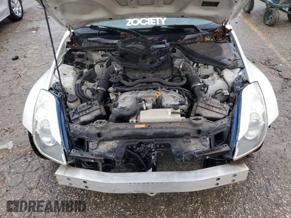 2008 Nissan 350Z Touring z VIN JN1BZ34D88M703866, wystawiony jako Copart lot #68671054 z przebiegiem 145 215 mil mil oraz Szkoda całkowita • Salvage title. Historia ofert i sprzedaży dostępna na DreamBid. Obrazek 11.
