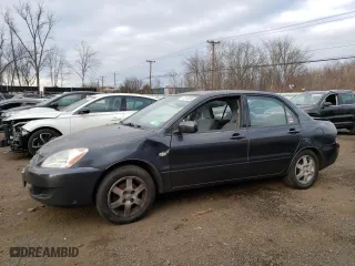 2004 Mitsubishi Lancer LS with VIN JA3AJ36E34U036316, listed as a Copart auction lot 87617655 with 140,855 mi miles and Salvage Title. Bid and sale history available at carsss.com. Image 1.