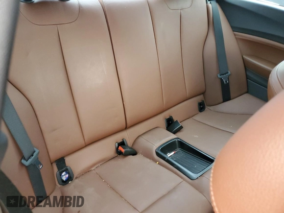 2015 BMW 2 Series M235i z VIN WBA1J7C54FV288793, wystawiony jako Copart lot #42937235 z przebiegiem Nie podano mil oraz Czysty tytuł • Clean title. Historia ofert i sprzedaży dostępna na DreamBid. Obrazek 10.