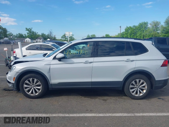 2018 Volkswagen Tiguan S with VIN 3VV0B7AX5JM025815, listed as a IAAI auction lot 42219906 with 168,122 mi miles and . Bid and sale history available at DreamBid. Image 14.