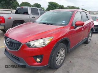 2015 Mazda CX-5 Touring with VIN JM3KE4CYXF0439953, listed as a IAAI auction lot 42124197 with 242,614 mi miles and . Bid and sale history available at DreamBid. Image 19.