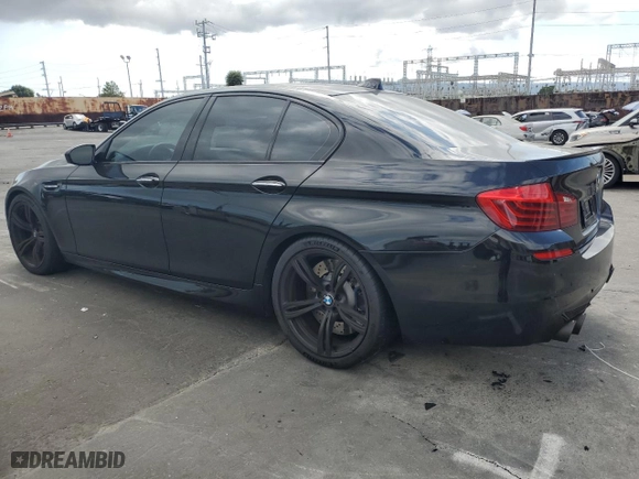 2015 BMW M5 with VIN WBSFV9C56FD594465, listed as a Copart auction lot 72085944 with 76,313 mi miles and Salvage Title. Bid and sale history available at carsss.com. Image 2.