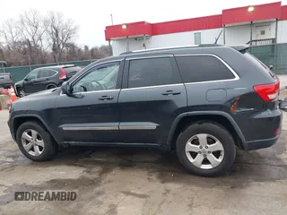 2013 Jeep Grand Cherokee Laredo with VIN 1C4RJFAG9DC506238, listed as a IAAI auction lot 41800981 with 172,676 mi miles. Bid and sale history available at carsss.com. Image 14.
