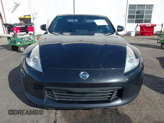 2013 Nissan 370Z with VIN JN1AZ4EH1DM880739, listed as a IAAI auction lot 40474120 with 76,369 mi miles. Bid and sale history available at carsss.com. Image 12.