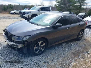 2020 Honda Civic LX with VIN 2HGFC2F6XLH509250, listed as a IAAI auction lot 41904206 with 52,583 mi miles and . Bid and sale history available at DreamBid. Image 18.