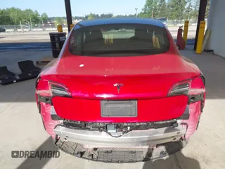 2020 Tesla Model 3 Standard Range Plus z VIN 5YJ3E1EA7LF611669, wystawiony jako IAAI lot #42179974 z przebiegiem 17 696 mil mil oraz . Historia ofert i sprzedaży dostępna na DreamBid. Obrazek 17.