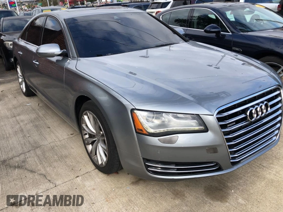 2012 Audi A8 с VIN WAUAVAFD2CN028862, выставлен на аукционе Copart как лот 80295204 с пробегом 162 752 миль миль и Чистый • Clean title. История ставок и продаж доступна на DreamBid. Изображение 1.