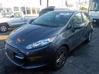 2017 Ford Fiesta SE with VIN 3FADP4BJXHM143529, listed as a Copart auction lot 27313020 with 67,577 mi miles and Salvage Title. Bid and sale history available at carsss.com. Image 2.