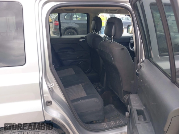 2014 Jeep Patriot Sport with VIN 1C4NJPBB7ED773445, listed as a IAAI auction lot 42205816 with 121,778 mi miles and . Bid and sale history available at DreamBid. Image 8.