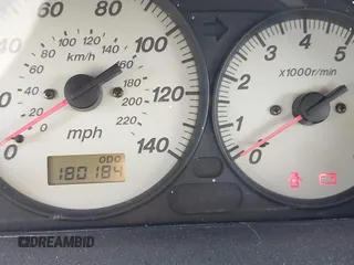 2002 Mazda Protege z VIN JM1BJ245221631014, wystawiony jako IAAI lot #42232912 z przebiegiem 180 184 mil mil oraz . Historia ofert i sprzedaży dostępna na DreamBid. Obrazek 14.