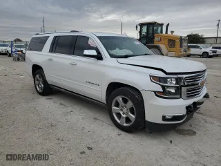 2017 Chevrolet Suburban Premier with VIN 1GNSCJKC3HR380897, listed as a Copart auction lot 79512474 with 121,928 mi miles and Salvage Title. Bid and sale history available at carsss.com. Image 4.
