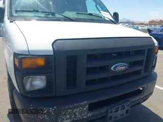 2014 Ford Econoline Cargo Commercial with VIN 1FTNE1EW9EDA17227, listed as a IAAI auction lot 40119708 with 231,292 mi miles and . Bid and sale history available at DreamBid. Image 6.