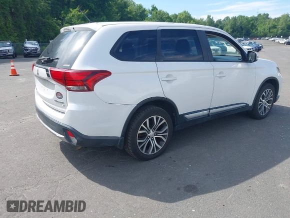 2016 Mitsubishi Outlander SE with VIN JA4AZ3A30GZ048604, listed as a IAAI auction lot 42682525 with Not provided miles and . Bid and sale history available at DreamBid. Image 4.