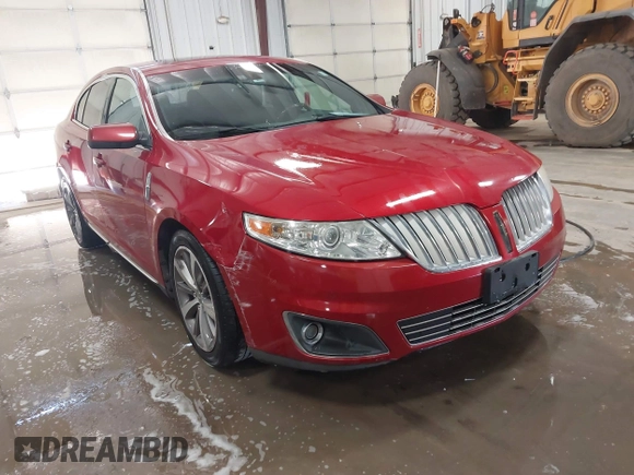 2009 Lincoln MKS with VIN 1LNHM94R59G610559, listed as a IAAI auction lot 41704552 with 168,556 mi miles. Bid and sale history available at carsss.com. Image 1.