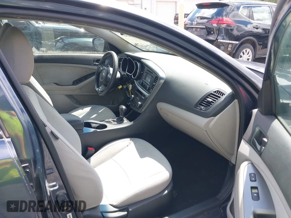 2015 Kia Optima LX z VIN KNAGM4A74F5590332, wystawiony jako IAAI lot #42304364 z przebiegiem 131 720 mil mil oraz . Historia ofert i sprzedaży dostępna na DreamBid. Obrazek 5.