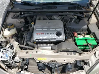 2004 Toyota Camry LE z VIN 4T1BF32K94U571035, wystawiony jako Copart lot #56749935 z przebiegiem 136 361 mil mil oraz Szkoda całkowita • Salvage title. Historia ofert i sprzedaży dostępna na DreamBid. Obrazek 11.
