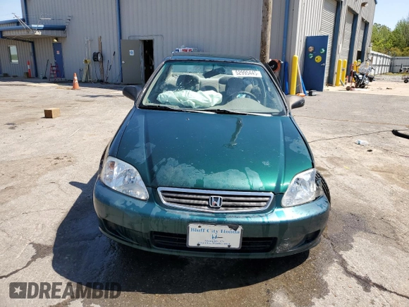 2000 Honda Civic LX with VIN 1HGEJ6677YL027802, listed as a Copart auction lot 52995445 with 221,233 mi miles and Salvage Title. Bid and sale history available at carsss.com. Image 5.