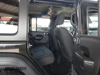 2019 Jeep Wrangler Unlimited Sport S with VIN 1C4HJXDN2KW630780, listed as a IAAI auction lot 41817573 with 56,113 mi miles and . Bid and sale history available at DreamBid. Image 8.