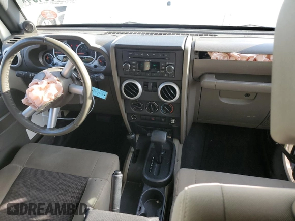 2010 Jeep Wrangler Sahara с VIN 1J4AA5D10AL181225, выставлен на аукционе Copart как лот 79696464 с пробегом 90 139 миль миль и Списание • Salvage title. История ставок и продаж доступна на DreamBid. Изображение 8.