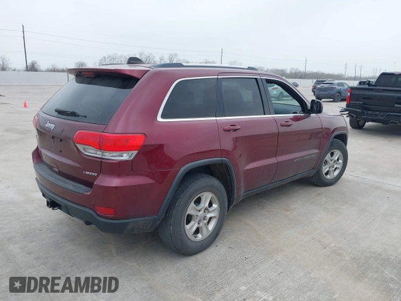 2017 Jeep Grand Cherokee Laredo with VIN 1C4RJEAG5HC780326, listed as a IAAI auction lot 41743223 with 73,675 mi miles. Bid and sale history available at carsss.com. Image 4.