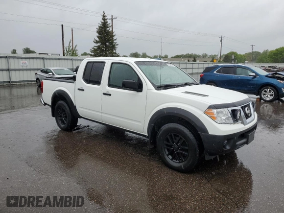 2018 Nissan Frontier SV with VIN 1N6AD0EV5JN744725, listed as a Copart auction lot 57601215 with 61,718 mi miles and Salvage title. Bid and sale history available at DreamBid. Image 4.