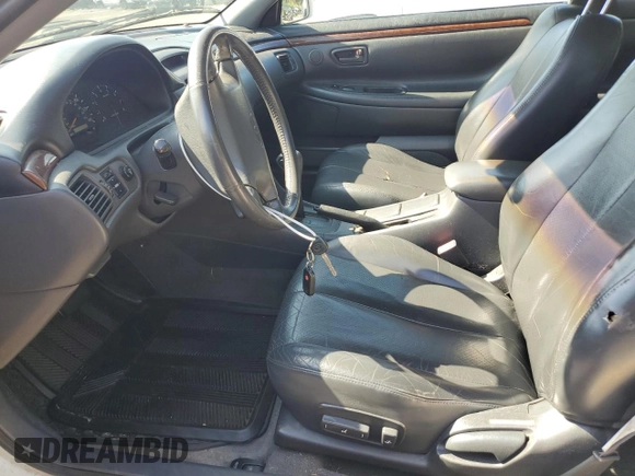 2000 Toyota Solara SE z VIN 2T1CF28P2YC378976, wystawiony jako Copart lot #61400195 z przebiegiem 197 090 mil mil oraz Czysty tytuł • Clean title. Historia ofert i sprzedaży dostępna na DreamBid. Obrazek 7.
