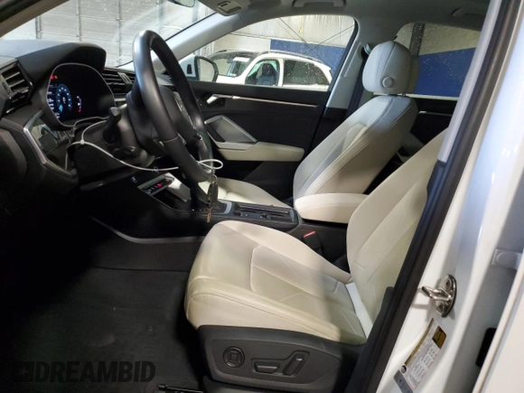 2022 Audi Q3 Premium with VIN WA1AUCF39N1047969, listed as a Copart auction lot 70757204 with 30,800 mi miles and Salvage Title. Bid and sale history available at carsss.com. Image 7.
