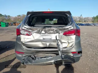 2018 Hyundai Santa Fe 2.4L z VIN 5NMZUDLB7JH077241, wystawiony jako IAAI lot #42135854 z przebiegiem 59 819 mil mil oraz . Historia ofert i sprzedaży dostępna na DreamBid. Obrazek 16.