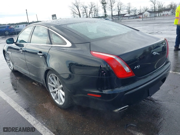 2011 Jaguar XJ with VIN SAJWA1CB8BLV12389, listed as a IAAI auction lot 41957217 with 51,585 mi miles. Bid and sale history available at carsss.com. Image 3.
