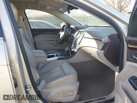 2014 Cadillac SRX Premium Collection with VIN 3GYFNDE37ES574109, listed as a IAAI auction lot 41770404 with 66,478 mi miles and . Bid and sale history available at DreamBid. Image 5.