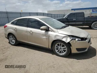 2017 Ford Focus SE with VIN 1FADP3F28HL299535, listed as a Copart auction lot 56958885 with 102,179 mi miles and Clean title. Bid and sale history available at DreamBid. Image 4.