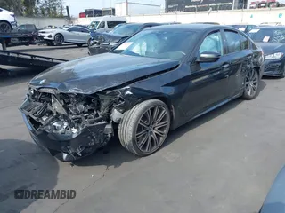 2018 BMW 5 Series 540i z VIN WBAJE5C5XJWA97667, wystawiony jako IAAI lot #41481362 z przebiegiem Nie podano mil oraz . Historia ofert i sprzedaży dostępna na DreamBid. Obrazek 20.