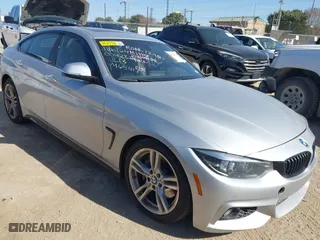 2019 BMW 4 Series 440i with VIN WBA4J5C50KBM65417, listed as a IAAI auction lot 41172512 with 106,117 mi miles. Bid and sale history available at carsss.com. Image 1.