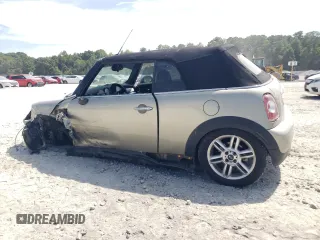 2011 MINI Convertible with VIN WMWZN3C54BT133246, listed as a Copart auction lot 69780074 with 176,955 mi miles and Salvage title. Bid and sale history available at DreamBid. Image 2.