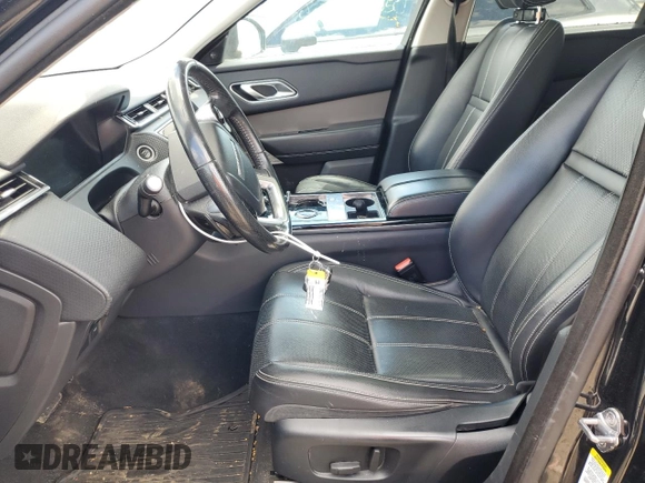 2018 Land Rover Range Rover Velar S z VIN SALYB2RN3JA732117, wystawiony jako Copart lot #58053655 z przebiegiem Nie podano mil oraz Czysty tytuł • Clean title. Historia ofert i sprzedaży dostępna na DreamBid. Obrazek 7.