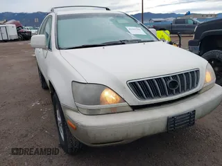 1999 Lexus RX 300 Luxury SUV with VIN JT6HF10U3X0033392, listed as a IAAI auction lot 41165188 with 233,343 mi miles. Bid and sale history available at carsss.com. Image 6.