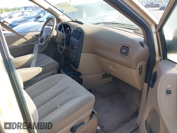 2001 Dodge Caravan Sport with VIN 2B8GP44381R223296, listed as a IAAI auction lot 42139126 with 129,260 mi miles and . Bid and sale history available at carsss.com. Image 5.