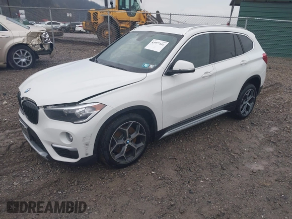 2018 BMW X1 xDrive28i with VIN WBXHT3C33J5L34824, listed as a IAAI auction lot 41977462 with 84,131 mi miles and . Bid and sale history available at DreamBid. Image 17.