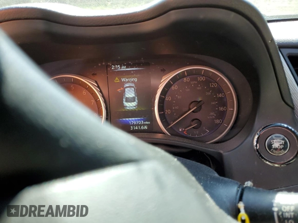 2015 Infiniti Q50 Premium with VIN JN1BV7AP0FM339781, listed as a Copart auction lot 53658315 with 179,703 mi miles and Salvage Title. Bid and sale history available at carsss.com. Image 9.