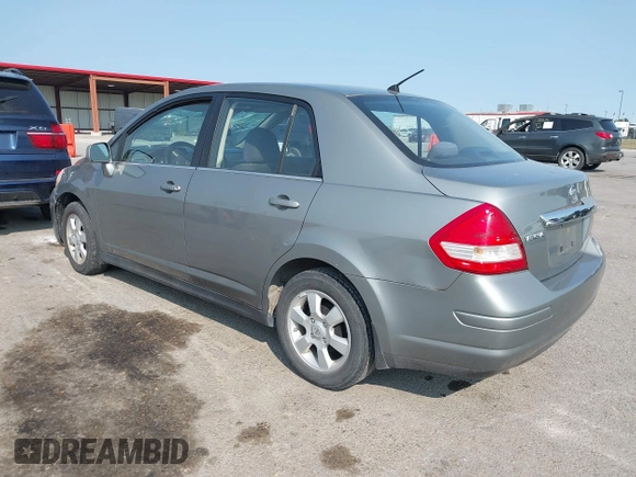 2007 Nissan Versa SL with VIN 3N1BC11E47L404371, listed as a IAAI auction lot 40309667 with 131,954 mi miles and . Bid and sale history available at DreamBid. Image 3.