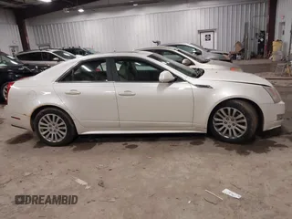 2010 Cadillac CTS Performance with VIN 1G6DL5EV1A0106648, listed as a IAAI auction lot 41722210 with 226,378 mi miles. Bid and sale history available at carsss.com. Image 13.